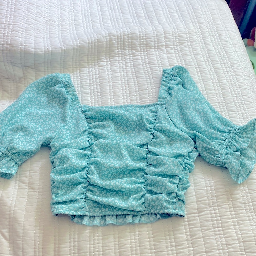Light green/blue top